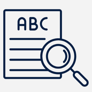 a piece of writing with ABC written in large letters and a magnifying glass