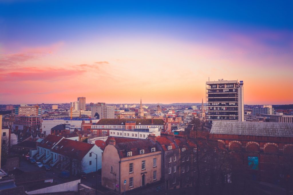Sunset over varied types of housing