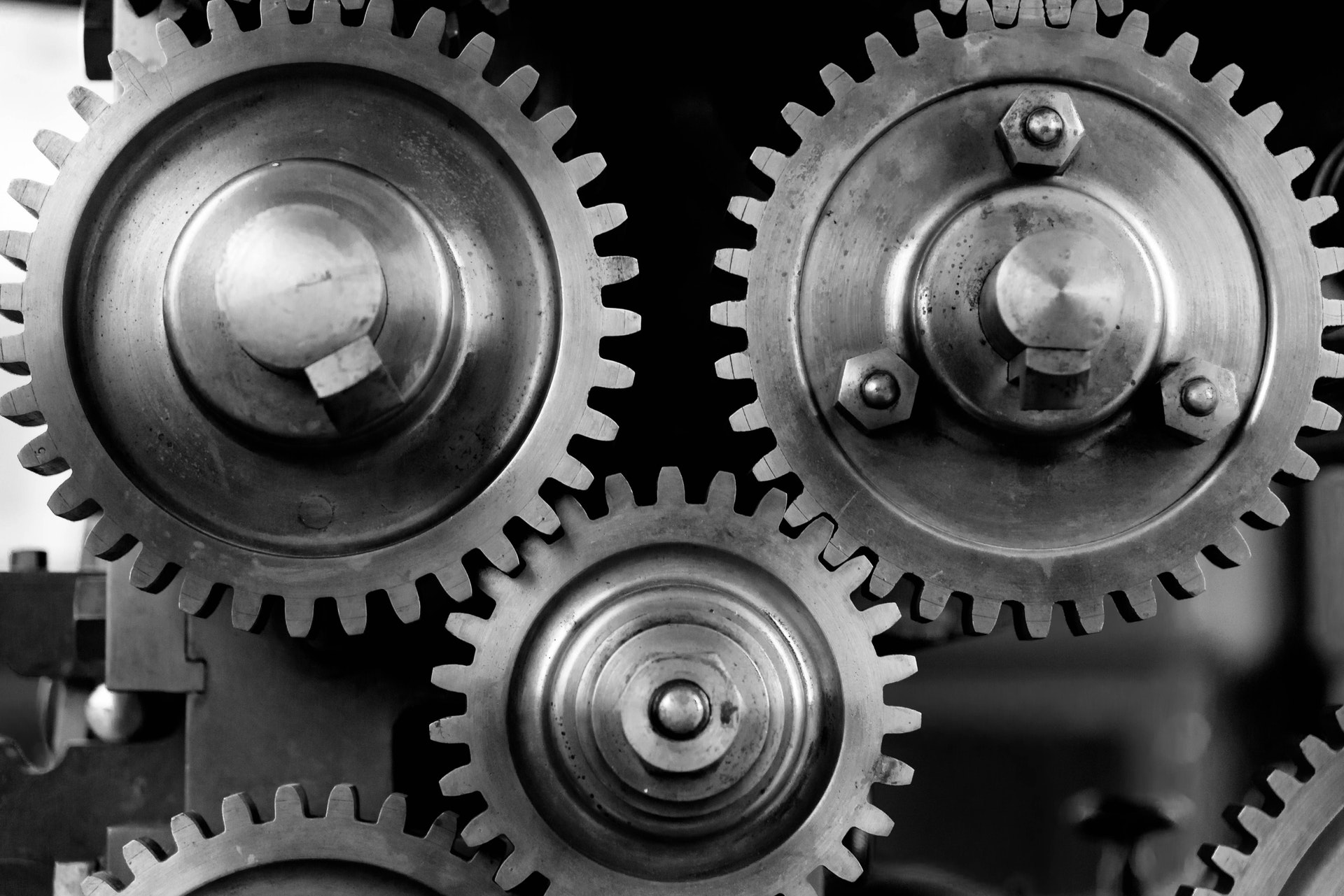 Interlocking silver cogs