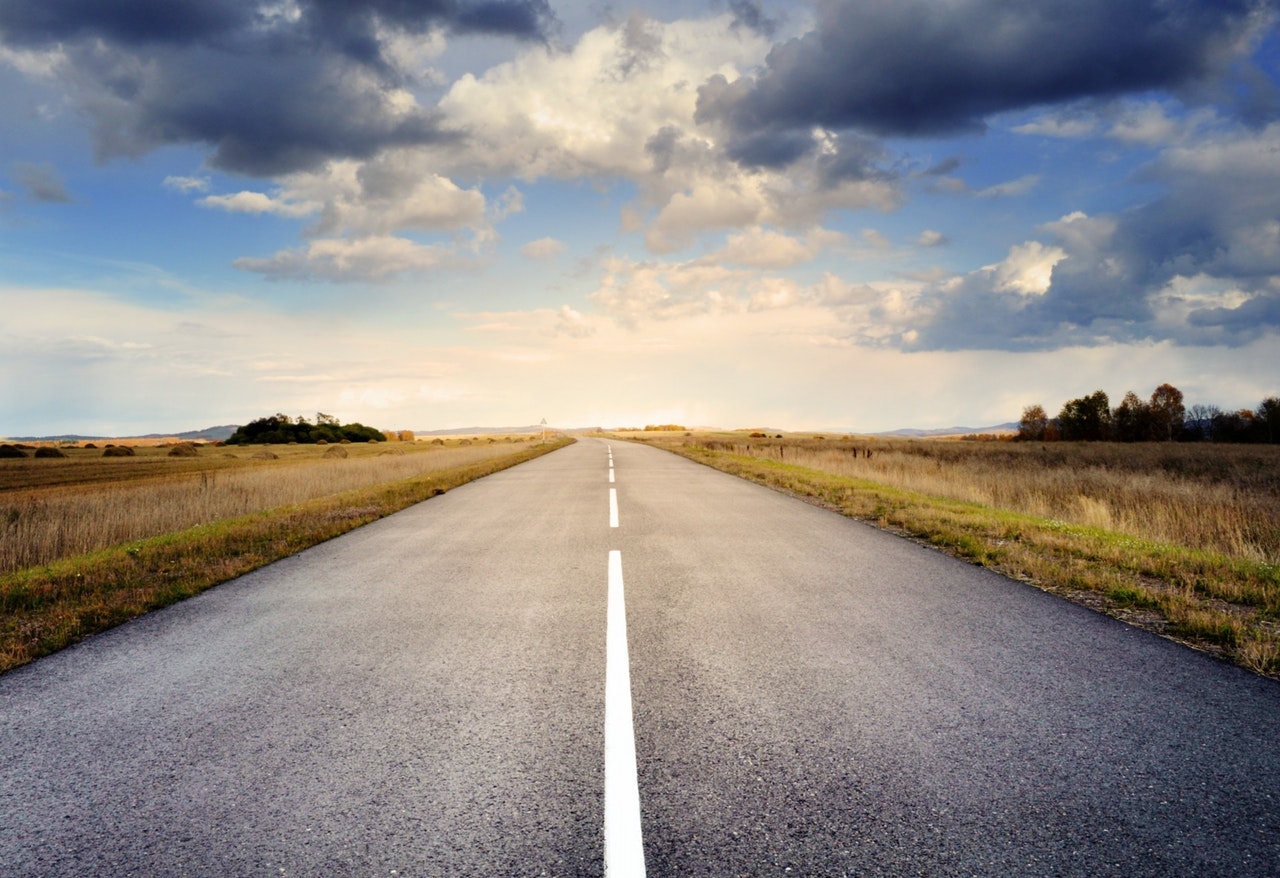 Road leading to a lighter hoizon