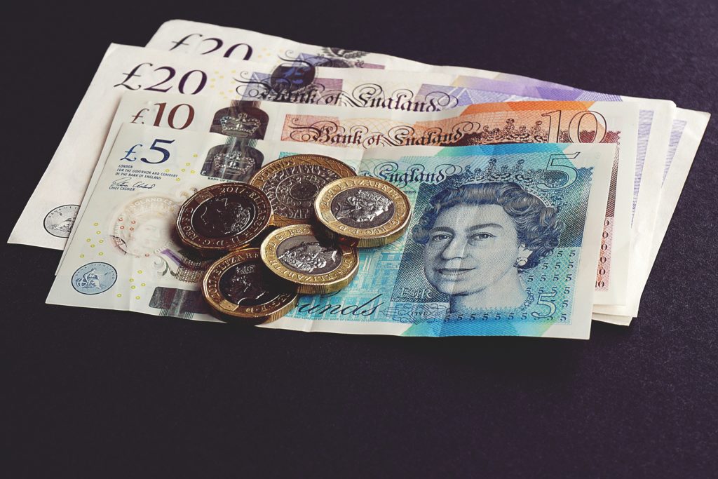 A picture of coins and notes