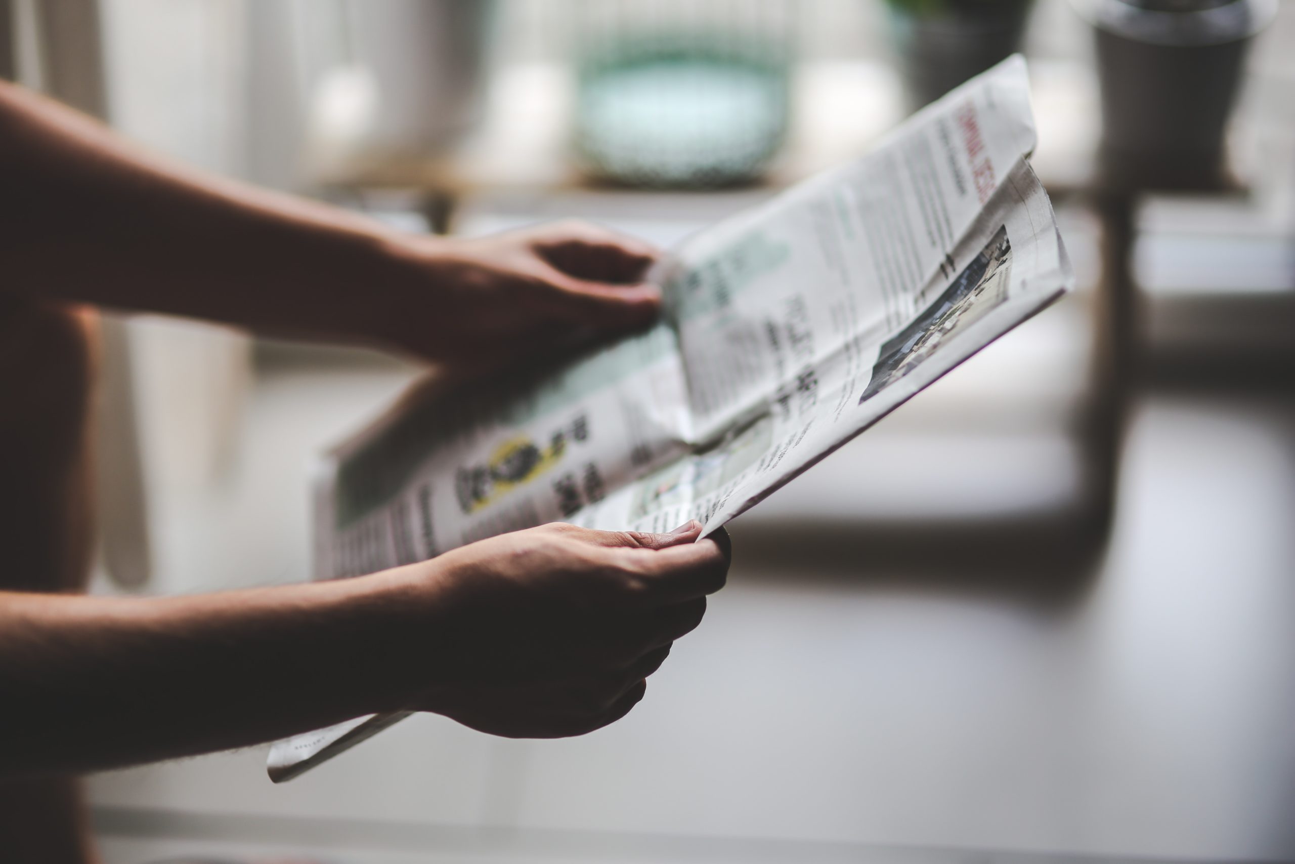 A man reading a newspaper