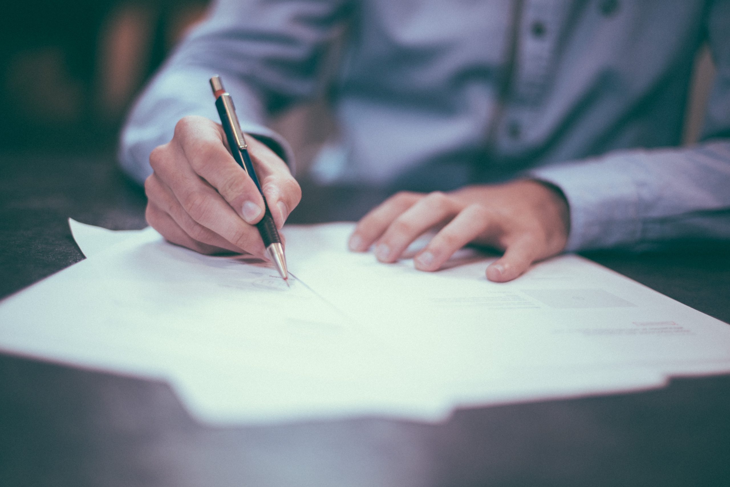 A man writing a letter