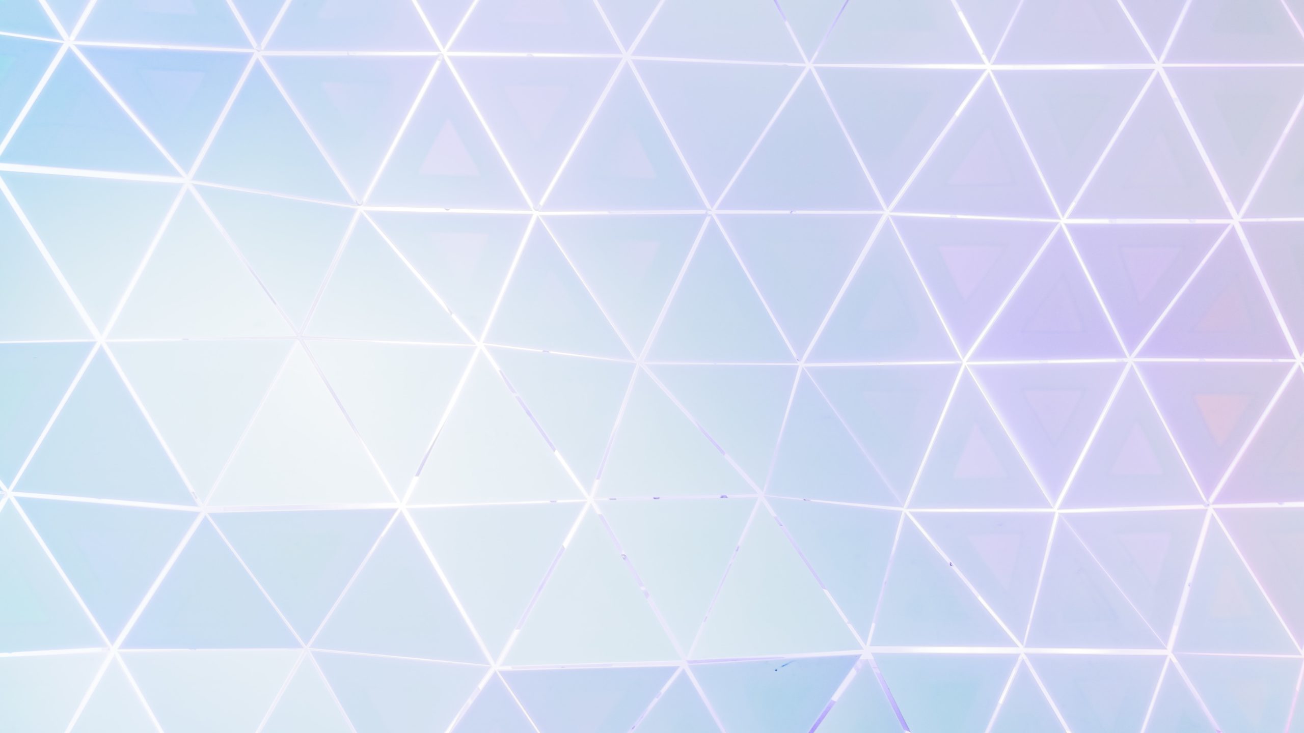 An abstract image of a structure built from white triangles