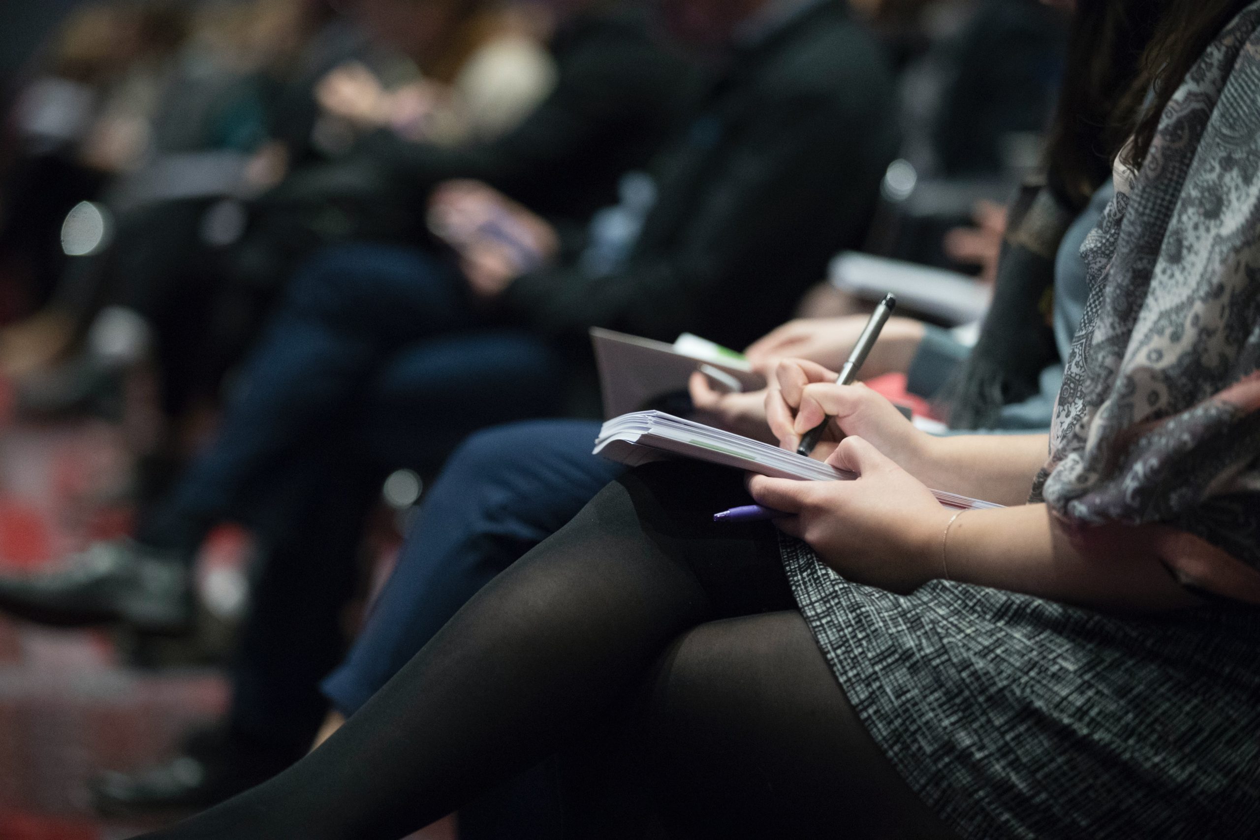 A journalist taking notes