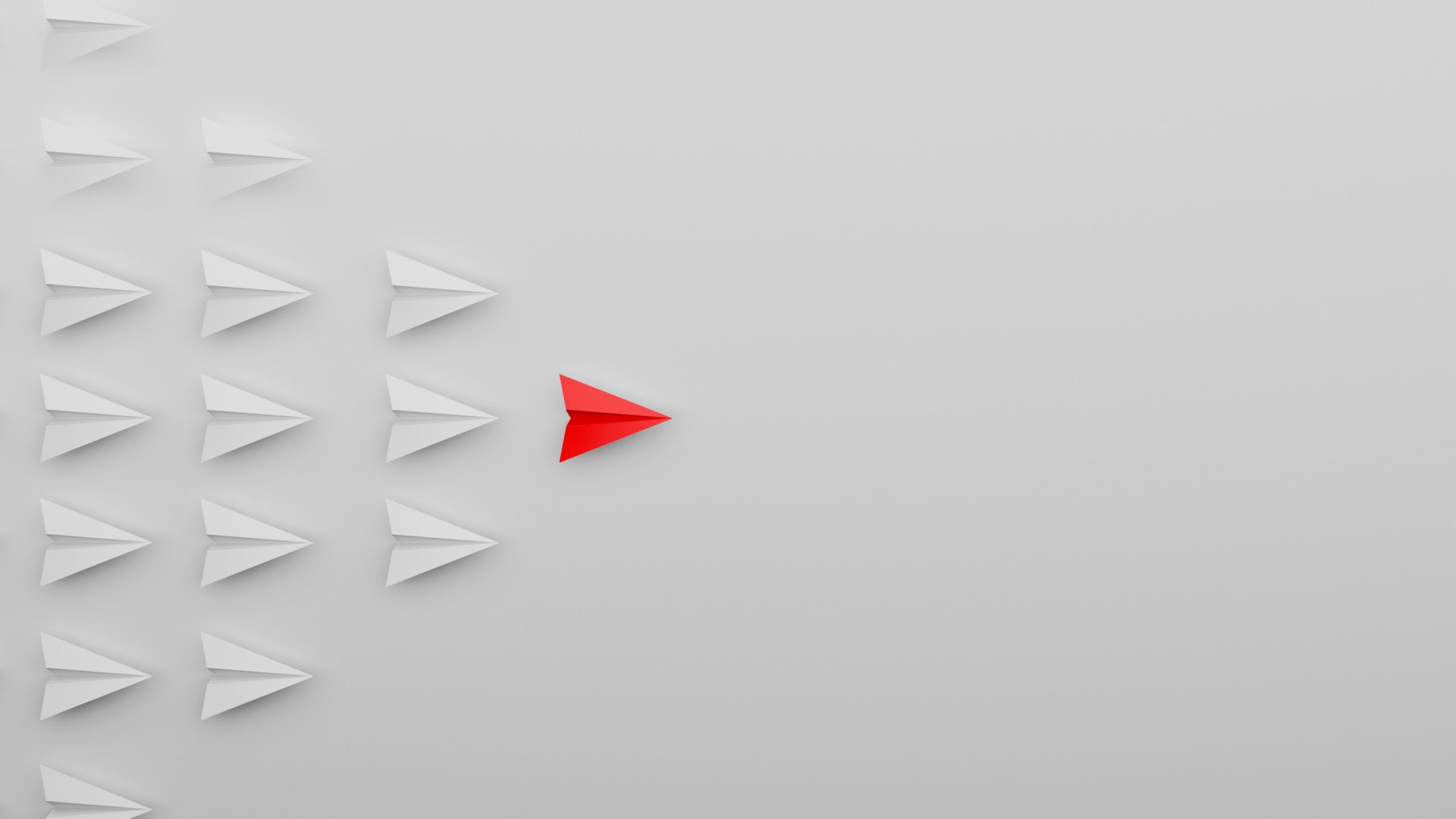 paper planes flying from left to right