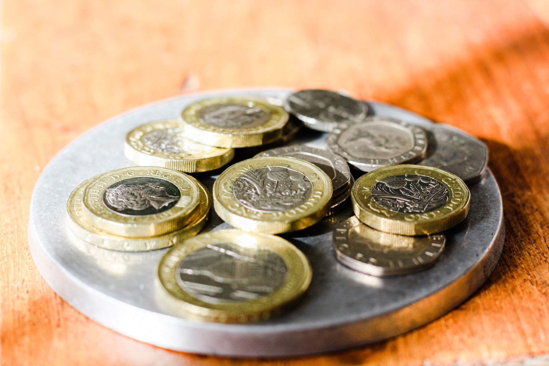 Image of pounds coins piled up