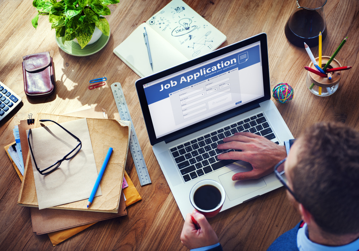 Decorative image. Laptop with job application