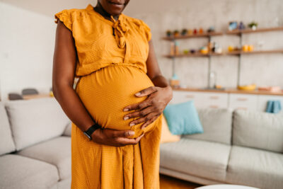 Decorative image. Pregnant belly