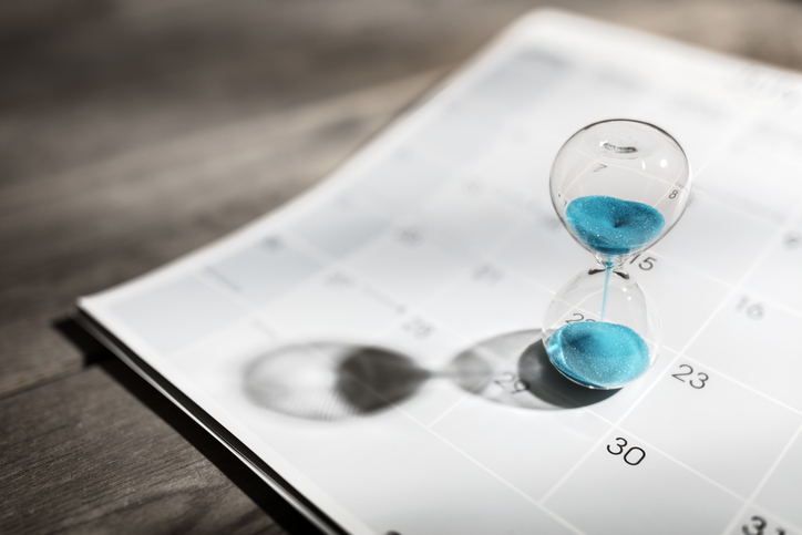 Decorative. A calendar and hourglass