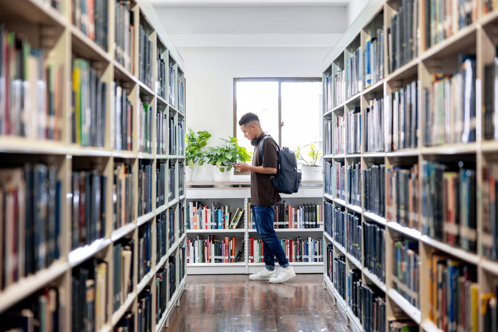 student in library - decorative