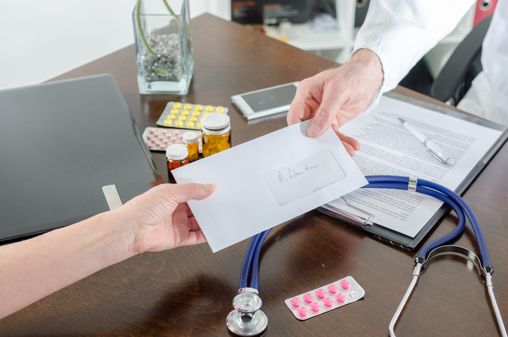 decorative image - handing over a medical referral