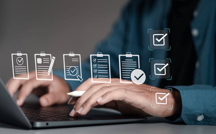 Decorative image of laptop and icons