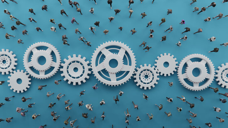 Decorative image of people and cogs